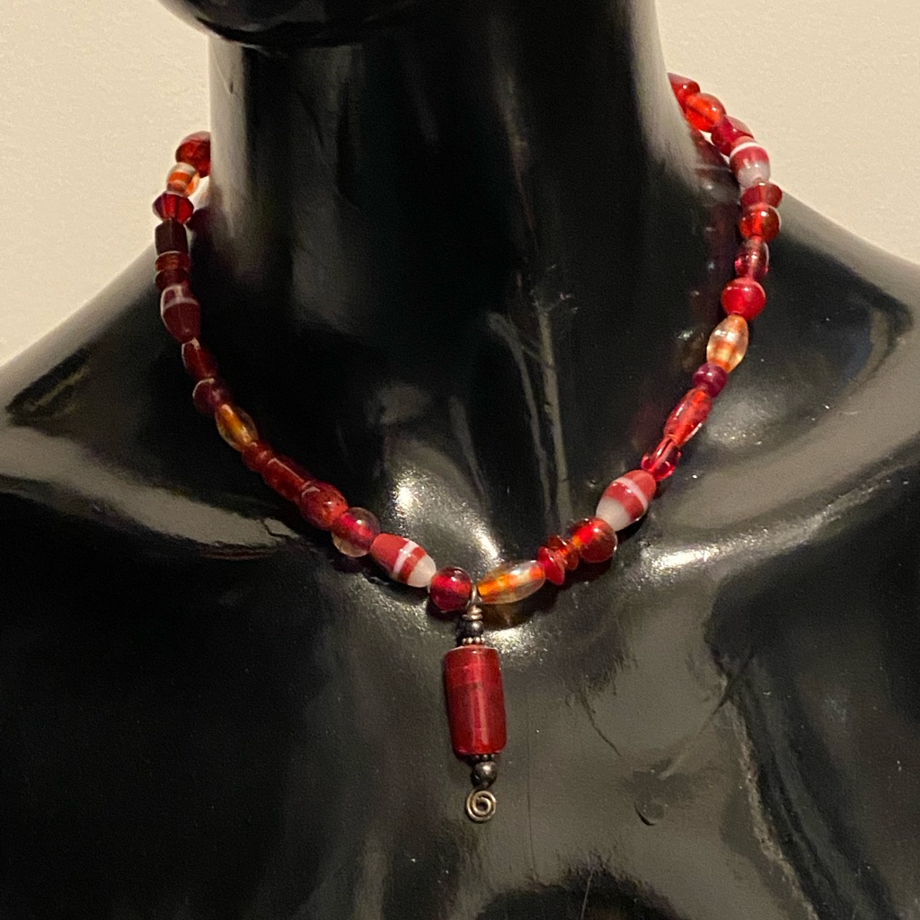 Red Bead Necklace W/ Cute Curlique End In Silver.